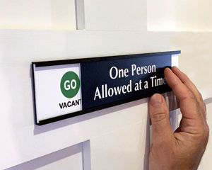 One person in bathroom at a time sign for social distancing