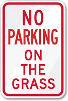 NO PARKING ON THE GRASS Sign