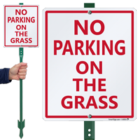 NO PARKING ON THE GRASS Sign