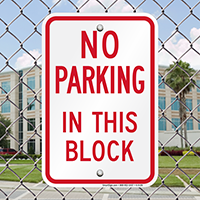 NO PARKING IN THIS BLOCK Signs