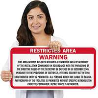 Warning This Area Declared A Restricted Area Sign