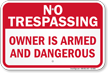 Owner Is Armed No Trespassing Sign