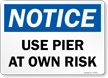 Notice Use Pier At Your Own Risk Sign