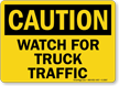 Caution Watch For Truck Traffic Sign
