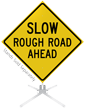 Slow Rough Road Ahead Roll Up Sign