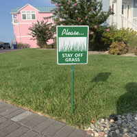 Stay off the grass sign