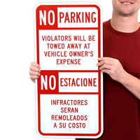 Violators Will Be Towed Sign