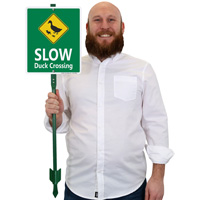 Slow Duck Crossing with Graphic Sign