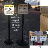 Reflective video surveillance sign