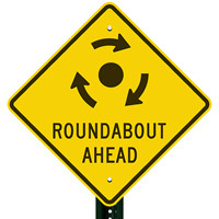 Roadabout Ahead with Clockwise Arrows Sign