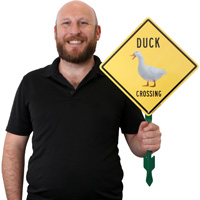 Duck crossing sign with duck symbol
