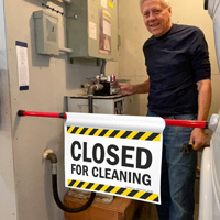 Cleaning in progress door sign