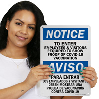 Bilingual vaccination requirement sign