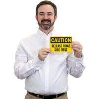 Caution: Open door by releasing hinge side first