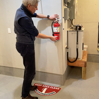 Fire extinguisher location sign